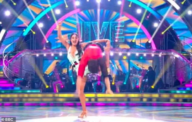 They had to stand apart to avoid conferring with each other but viewers spotted Katya appearing to stare at Lewis as she lifted her leg to the side - the very move they ended the dance on (seen)