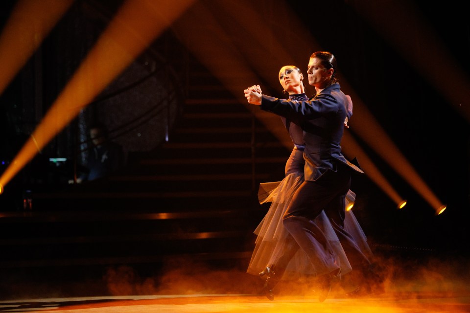 Lewis Cope and Katya Jones dancing together.