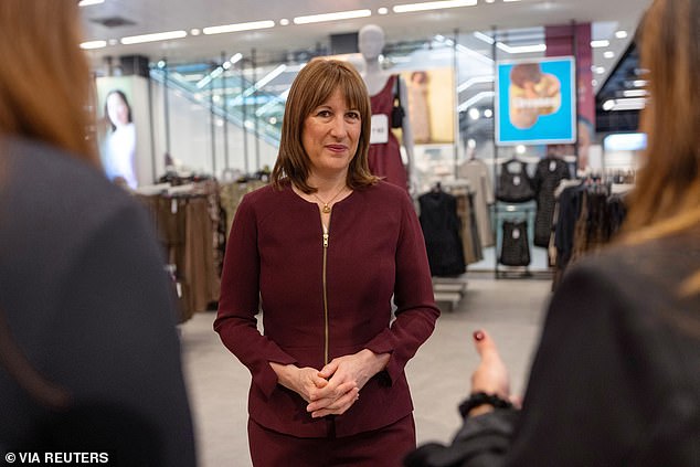 Food prices are set to rise, as a U-turn by Rachel Reeves will hit supermarkets with a higher business rates bill. Pictured: British Chancellor of the Exchequer, Rachel Reeves, looks on as she speaks with staff at a Primark store in London, England, November 24, 2025