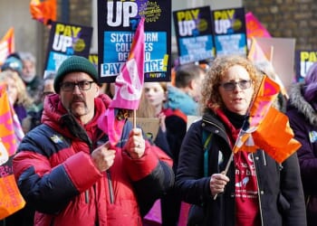 Members of the National Education Union (NEU) are pictured holding a rally outside the Department for Education (DfE) in London during strike action in November 2024