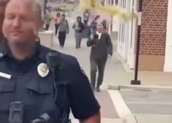 Emily Cervantes Ramos, 18, was arrested on Friday after she allegedly threw a drink at a police officer's head in Kannapolis, North Carolina during an anti-ICE protest