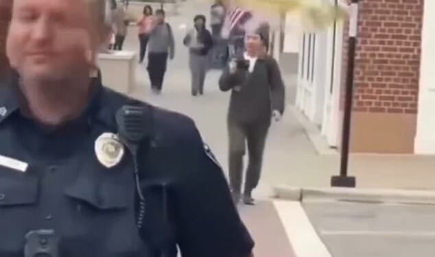 Emily Cervantes Ramos, 18, was arrested on Friday after she allegedly threw a drink at a police officer's head in Kannapolis, North Carolina during an anti-ICE protest