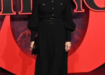 Linda Hamilton, 69, revealed that she does 'not spend a moment trying to look younger on any level, ever,' in an interview with AARP Movies for Grownups published on Tuesday; pictured November 13 in London