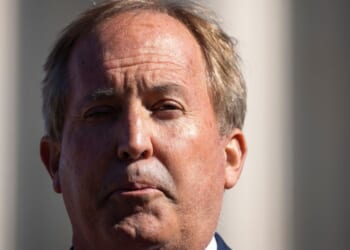 Texas Attorney General Ken Paxton speaks outside the U.S. Supreme Court on Nov. 1, 2021, in Washington, D.C.