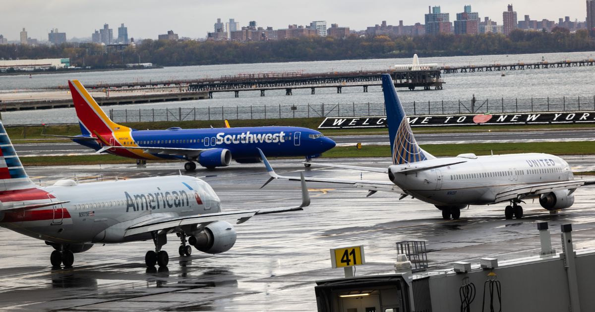 Planes line up on the tarmac at LaGuardia Airport on Nov. 10, 2025, in New York City.