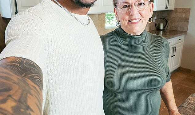 Wanda Dench, 68, and Jamal Hinton, 26, became unlikely friends in 2016 after a mistaken Thanksgiving text. They are pictured together ahead of Thanksgiving 2025
