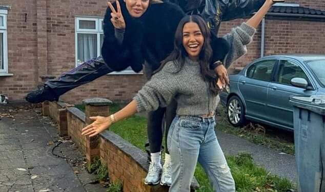 Emma Grede (centre) pictured with two of her sisters outside the humble 1970's terraced house in Plaistow, east London, where she grew up before finding fame and fortune
