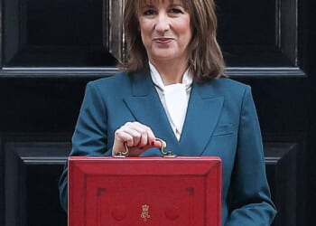 Britain is facing a new 'brain drain' that threatens to add to the pain of Rachel Reeves' disastrous Budget. Pictured: British Chancellor of the Exchequer Rachel Reeves poses with the red budget box outside 11 Downing Street in London, Britain, November 26, 2025