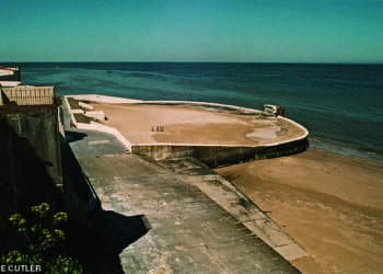 Margate Lido in Kent, pictured in 2004 after it had been filled in with sand following its closure about two decades before. It was one of many lidos which fell into decline after spending cuts