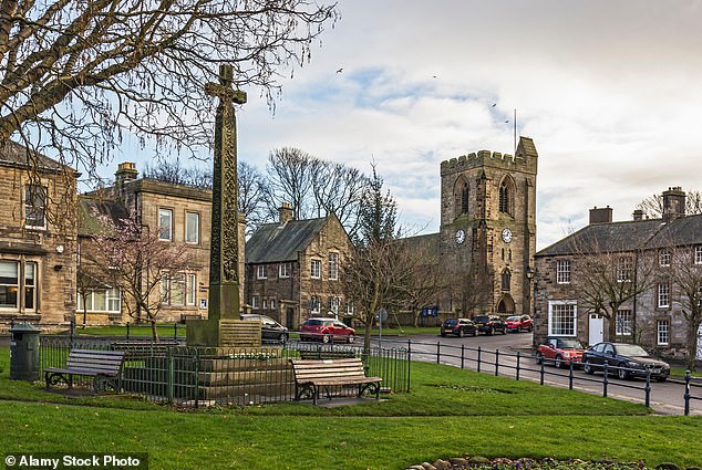 The chocolate box market town of Rothbury (pictured) is lined with sandy brick cottages and quaint shops