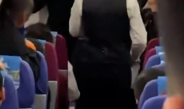 Footage from inside the plane seems to show a crowd at the end of the aircraft