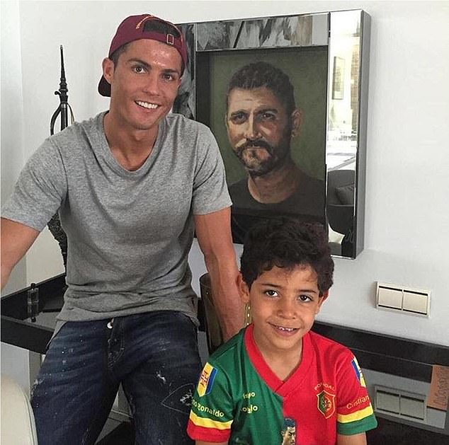 Three generations of Ronaldo: Jose Dinis Aveiro, Cristiano Ronaldo and Cristiano Ronaldo Jr