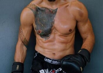 Thuggish former kickboxer Andrew Tate (currently under investigation for human trafficking, which he denies)