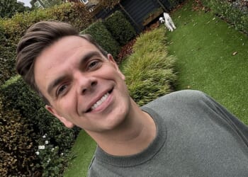 Upbeat: Gareth Davies thinks an artificial lawn is great for dog owners