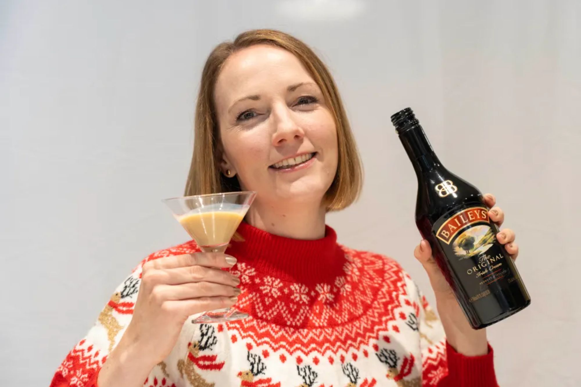 An image collage containing 1 images, Image 1 shows Rosie Taylor holding a glass of cream liqueur and a bottle of Baileys