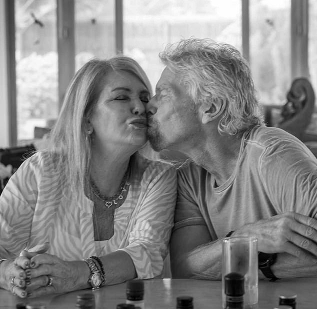 Sir Richard kisses his wife Lady Branson in a photo he shared to pay tribute to her