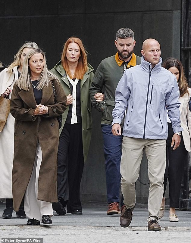 Elsie Dot Stancombe's parents Jenni (left) and David (right) with Bebe King's parents Lauren and Ben (centre) arrive at Liverpool Town Hall for the Southport Inquiry