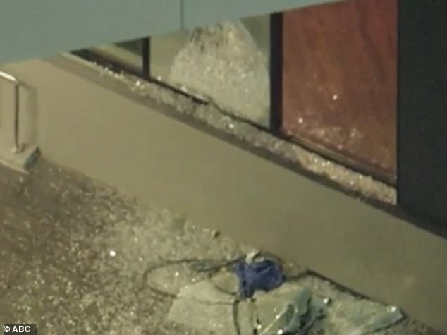 A bullet shattered the window of one of the stores inside of the mall