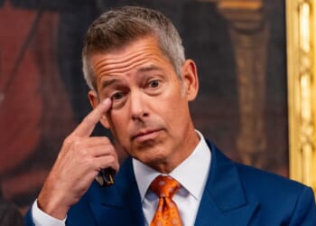 Transportation Secretary Sean Duffy touches his face during a news conference in the U.S. Capitol on Oct. 23, 2025 in Washington, DC.