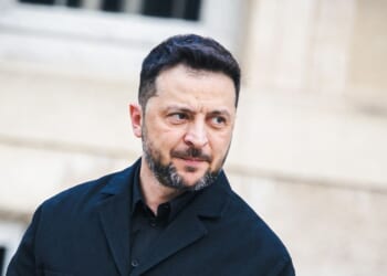 Ukrainian President Volodymyr Zelensky walks across the courtyard before his meeting with French President Emmanuel Macron at the Presidential Palace in Paris, France, on Nov. 17, 2025.