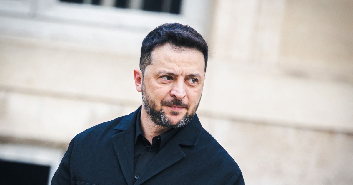 Ukrainian President Volodymyr Zelensky walks across the courtyard before his meeting with French President Emmanuel Macron at the Presidential Palace in Paris, France, on Nov. 17, 2025.