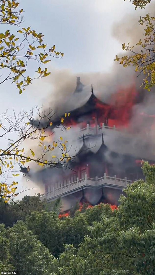 The fire broke out at Wenchang Pavilion on Fenghuang Mountain in Zhangjiagang, Jiangsu province, on November 12th