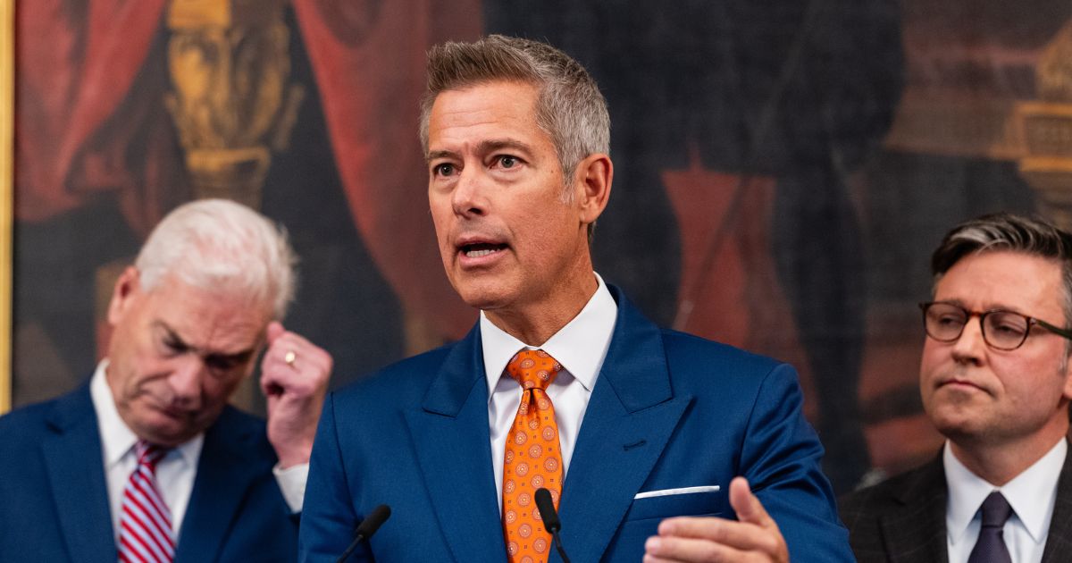 Secretary of Transportation Sean Duffy speaks alongside Rep. Tom Emmer, a Republican from Minnesota, and Speaker of the House Mike Johnson, a Republican from Louisiana, during a press conference on air traffic controller pay and the government shutdown at the U.S. Capitol on Oct. 23, 2025, in Washington, D.C.