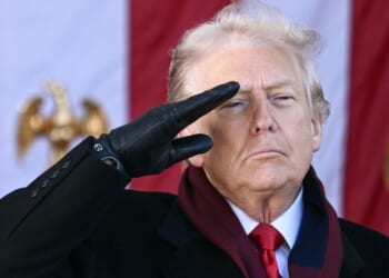 President Donald Trump salutes at Arlington National Cemetery in Arlington, Virginia, on Nov. 11, 2025.