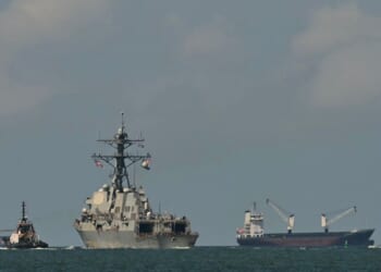 The USS Gravely, a U.S. Navy warship, departs the Port of Spain on Oct. 30, 2025. The US warship arrived in Trinidad and Tobago on Oct. 26, 2025, for joint exercises near the coast of Venezuela.