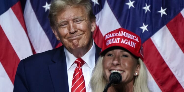 Rep. Marjorie Taylor Greene speaks alongside President Donald Trump at a campaign event in Rome, Georgia, on March 9, 2024.