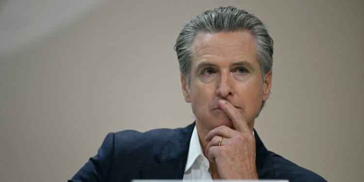 California Gov. Gavin Newsom attends a press conference during the COP30 UN Climate Change Conference in Belem, Para State, Brazil, on Nov. 11, 2025.