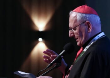 Cardinal Louis Raphael Sako, the Patriarch of the Chaldean Catholic Church, addresses addresses church members in Arbil, the capital of the autonomous Kurdish region of northern Iraq, on April 23, 2025.