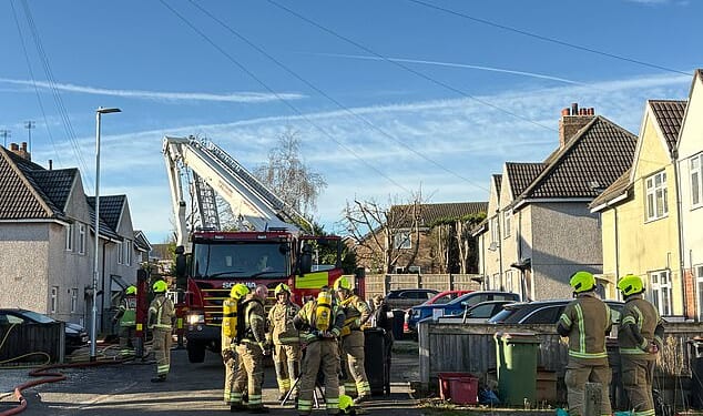 Firefighters on Holywell Avenue in Ashby-de-la Zouch, Leicestershire, this morning