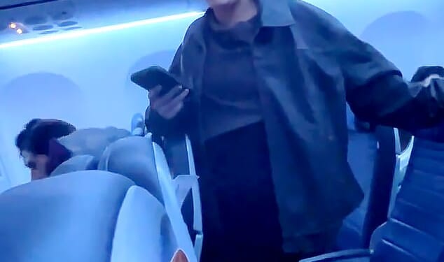 A blonde woman was seen repeatedly shouting a vulgar slur at airline crew members and passengers while on board a United Airlines flight on November 9 in Newark, New Jersey