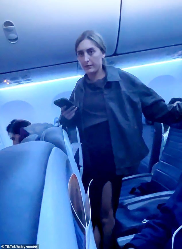 A blonde woman was seen repeatedly shouting a vulgar slur at airline crew members and passengers while on board a United Airlines flight on November 9 in Newark, New Jersey
