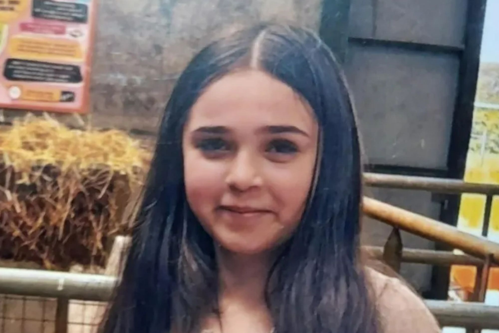 An image collage containing 1 images, Image 1 shows Kerry, a young girl with long dark hair, wearing a beige long-sleeved top and a necklace, holding a phone