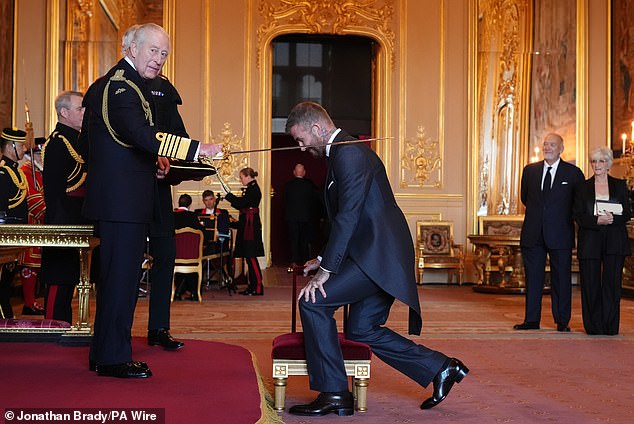 The former footballer, 50, was honoured by King Charles at Windsor Castle on Tuesday, receiving a knighthood for his outstanding contribution to sport and charity