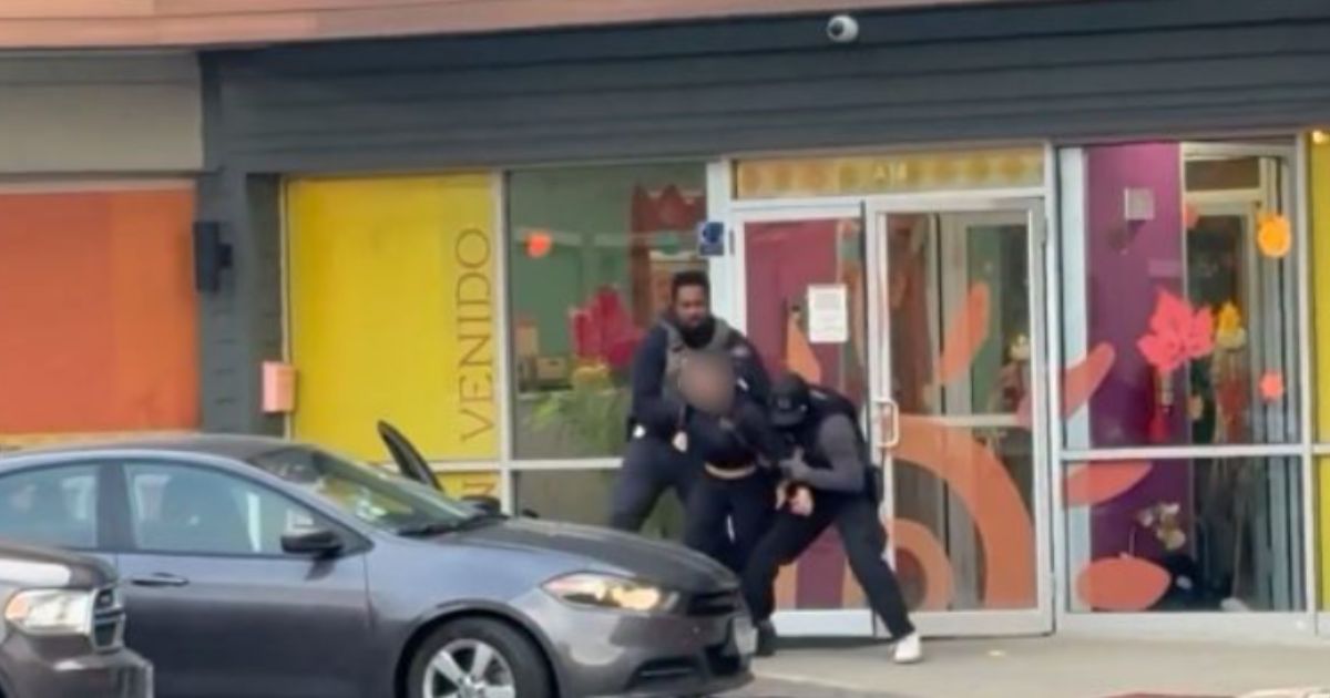 ICE agents arrest an illegal immigrants who was working as a teacher at Rayito de Sol Spanish Immersion Early Learning Center in Chicago, Illinois, on Wednesday.