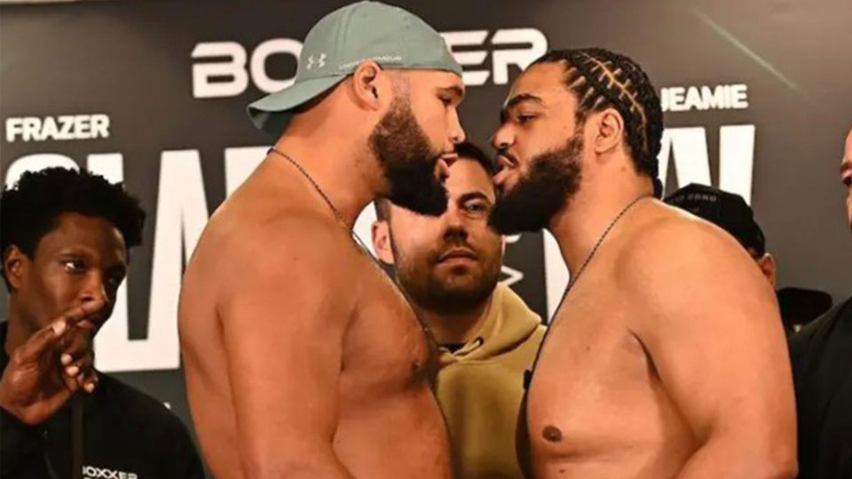 Boxers Frazer Clarke and Jermaine Franklin face off at a weigh-in.