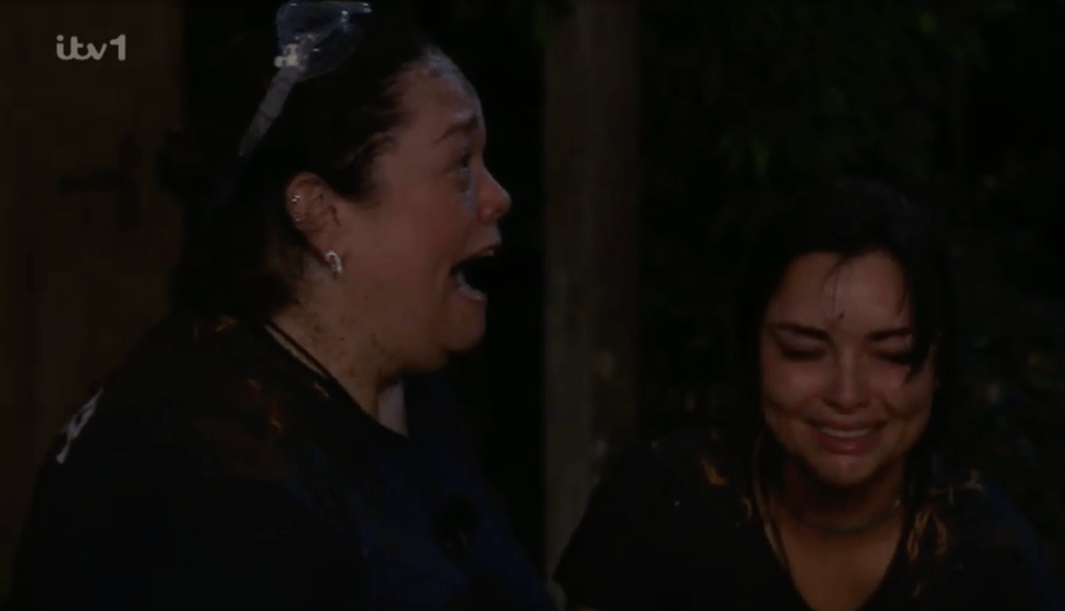 Two women with a substance covering their faces, one with her mouth open screaming and the other smiling with her eyes closed, on a TV show.