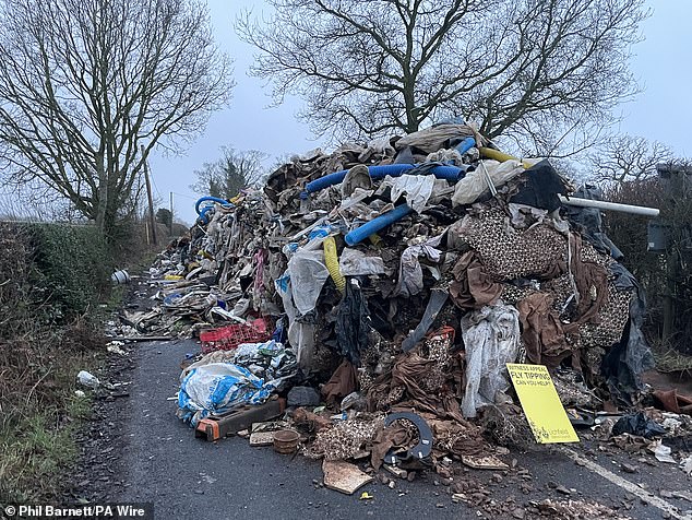 Some 98 per cent of local authorities polled say that illegal waste dumping is an issue in their area and more than half report that incidents have increased in the past year. Pictured: A 10-ft-high pile of waste from Watery Lane, on the outskirts of Lichfield in Staffordshire