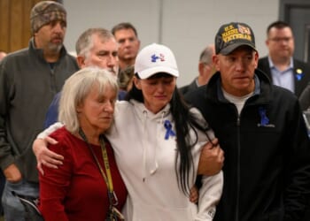 Community members gather at a vigil for West Virginia National Guard Specialist Sarah Beckstrom at the town hall on Nov. 28, 2025, in Webster Springs, West Virginia.