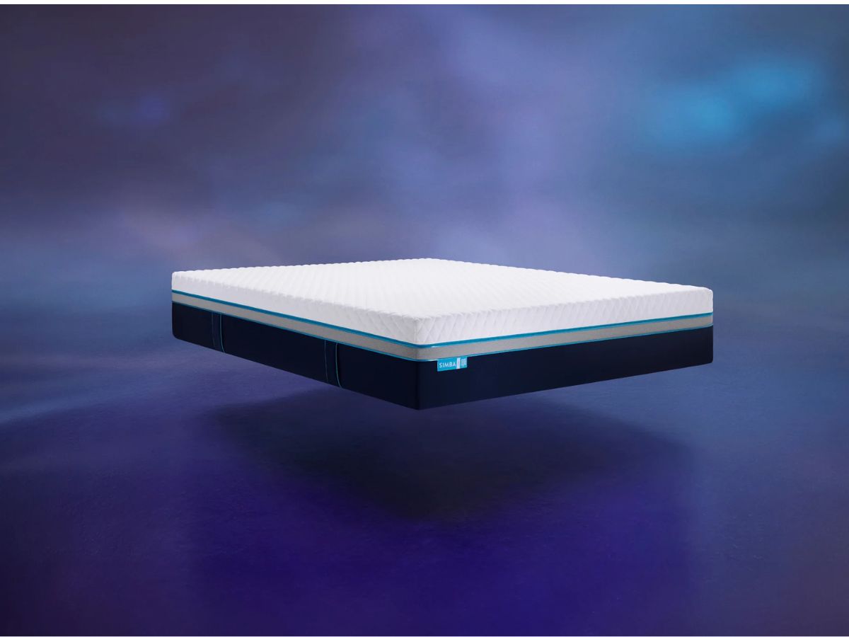 A white mattress with blue and gray trim and a Simba tag floating against a blue background.