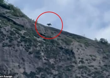 This is the heart-stopping moment a base jumper slammed into a cliff face and spiralled out of control ¿ coming within seconds of death before his parachute miraculously deployed