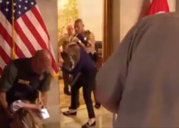 Democratic Tennessee candidate Aftyn Behn is dragged out of Gov. Lee's office as she sobs after she charged into it uninvited.