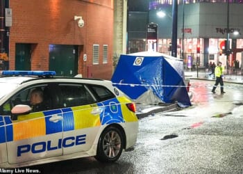 A 34-year-old woman was stabbed in the neck in an 'unprovoked attack' in Birmingham city centre on Friday night. Picture from the scene