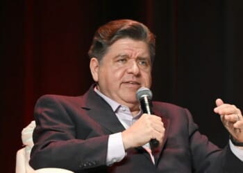 Illinois Gov. J.B. Pritzker speaks on stage during Vox Media's Pivot Tour at the Chicago Theatre on Nov. 12, 2025, in Chicago, Illinois.