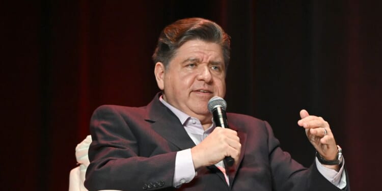 Illinois Gov. J.B. Pritzker speaks on stage during Vox Media's Pivot Tour at the Chicago Theatre on Nov. 12, 2025, in Chicago, Illinois.