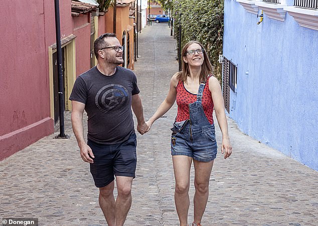 Alan and Katie Donegan (pictured) have revealed how they saved enough money to retire young