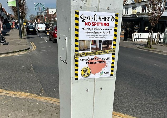 A sign in Gujarati and English in Wembley warns people to avoid spitting paan in public areas